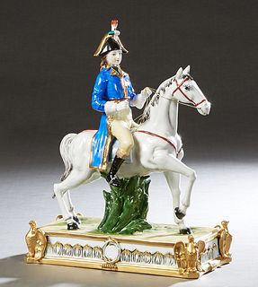 Dresden Style Porcelain Napoleonic General on Horseback, late 19th c., by Richard Klemm, on a gilt rectangular base with a gilt eagle on each corner, 
