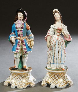 Pair of Old Paris Polychromed Porcelain Figural Parfumiers, 20th c. of a lady and a gentleman in 19th c. dress, on integral gilt decorated shaped b