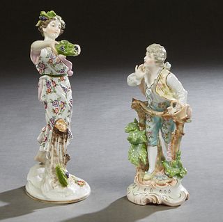 Two German Style Porcelain Figures, 20th c., one of a youth with crossed arms and a basket of flowers; the other Meissen style of a woman bearing a cr
