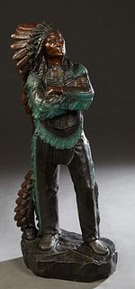 After Carl Kauba (1865-1922, Austrian), "Defiant Standing Native American Chief," 20th /21st c., patinated bronze, on an integral base, H.- 29 1/2 in.