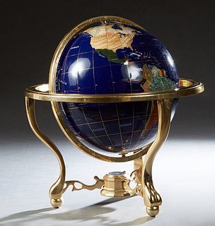 Contemporary Polished Mineral Specimen World Globe, 20th c., on a turned brass tripodal base, H.- 20 in., Dia.- 18 in. Provenance: Palmira, the Estate