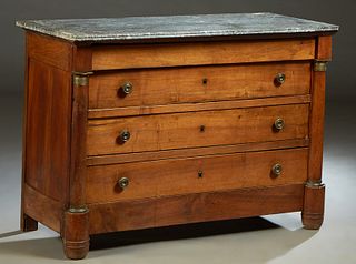 French Empire Carved Cherry Marble Top Commode, c. 1840, the highly figured rounded corner reeded edge gray marble over a frieze drawer and three setb