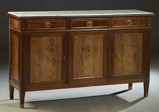 French Louis XVI Style Carved Mahogany Ormolu Mounted Sideboard, 20th c., the inset figured white marble over three frieze drawers above three cupboar