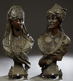 Pair of Large Patinated Spelter Art Nouveau Busts, late 19th c., of an Arab man and woman, on an integral relief base with block feet, H.- 29 in., W.-