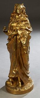After Gaston Leroux (1854-1942, French) "Gilt Bronze Orientalist Maiden," late 19th c., perhaps Cleopatra, standing next to an obelisk with inscribed 