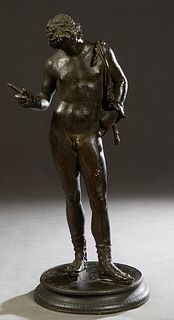 Giovanni Varlese (Act. 1888-1922), "Narcissus," patinated bronze, signed and placed "Napoli" on the top of the integral circular base, H.- 24 in., Dia