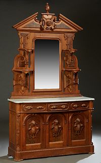 American Victorian Carved Walnut Marble Top Sideboard, 19th c., the back with a broken arch crest over a rounded corner mirror flanked by four graduat