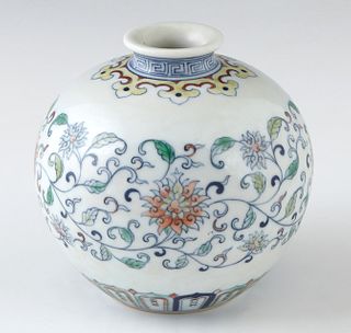 Diminutive Chinese Porcelain Baluster Vase, 19th c., Qing Dynasty, with a Greek key design everted neck over a floral and leaf decorated side, the und