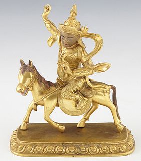Tibetan Gilt Bronze Female on Horseback, 19th c., on a gilt bronze copper base, now in a fitted blue cloth box, H.- 7 in., W.- 5 3/4 in., D.- 2 3/4 i