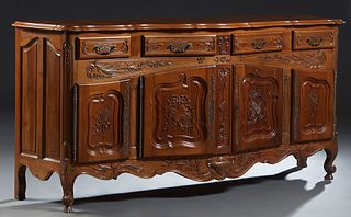 French Louis XV Style Carved Walnut Bombe Sideboard, 20th c. the parquetry inlaid stepped edge top above double cupboard doors with long iron escutche