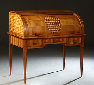 French Louis XVI Style Carved Inlaid Cherry Cylinder Desk, 20th c., the rectangular top over a parquetry inlaid cylinder desk and inlaid sides, openin