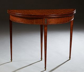 French Inlaid Mahogany Louis XVI Style Games Table, 20th c., the parquetry Inlaid demilune top over a marquetry inlaid skirt, with a rear drawer, open