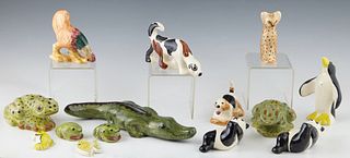 Fourteen Shearwater Pottery Animals, 2002 and 2003, consisting of an alligator, two pandas, an angel fish, a seahorse, two large frogs, two smaller fr