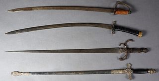 Group of Four Swords, 19th and 20th c., one with a carved mahogany handle and an iron hand guard; one a Knights of Columbus ceremonial sword, by T. C,