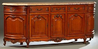 French Louis XV Style Carved Cherry Marble Top Sideboard, 20th c., the thick ogee edge highly figured ocher and violette marble atop three frieze draw