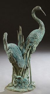 Patinated Bronze Fountain Figure, 20th c., of two herons in vegetation, on an integral circular base, H.- 41 1/2 in., W.- 23 in., D.- 14 in. Provenanc