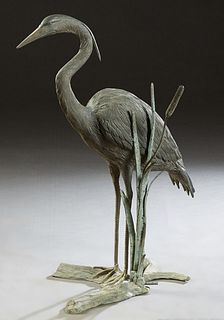 Patinated Bronze Garden Statue, 20th c., of a heron among cattails, on a branch form base, H.- 36 in., W.- 24 in., D.- 15 in. Provenance: Palmira, the