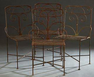 Set of Four Wrought Iron Patio Chairs, 20th/21st c., the scrolled canted back over hip rails to a slatted seat, on cylindrical legs joined by a cylind