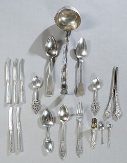 Group of Seventeen Silver Items, 19th and 20th c., consisting of a sterling ladle, two fiddle back tablespoons, a folding medicine spoon; an .800 silv