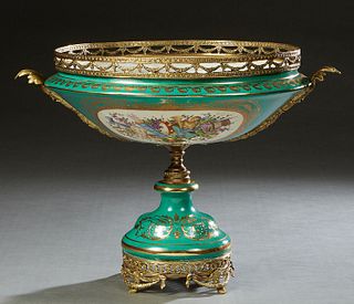 Bronze Mounted Sevres Style Porcelain Centerbowl, late 20th c., the pierced garland bronze rim over apple green sides with reserves of flowers and mus