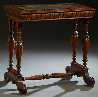 French Henri II Style Carved Walnut Marble Top Console Table, c. 1880, the stepped top with an inset highly figured gray marble, over a rounded reeded