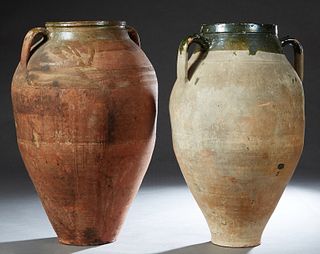 Two Large French Provincial Partially Glazed Pottery Baluster Jars, each with two applied ring handles, Larger- H.- 26 in., Dia.- 16 in. Provenance: P