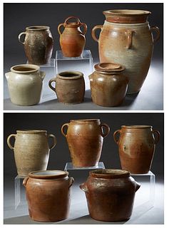 Group of Eleven Pieces of French Provincial Pottery, 19th and 20th c., consisting of a large glazed four handled example; two unglazed with single rin