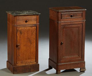Two French Louis Philippe Carved Walnut Nightstands, 19th c., one with a highly figured gray marble top over a frieze drawer and a long cupboard door,