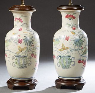 Pair of Chinese Porcelain Crackleware Baluster Vases, 20th c., the gilt everted rim over floral and leaf painted sides and shoulders, on a white groun
