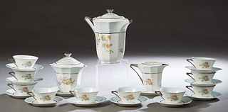 Twenty-Five Piece Coffee Service of Limoges Porcelain, 20th c., by Paulhat, with floral and enamel decoration, signed J. Ponty, consisting of 10 cups,