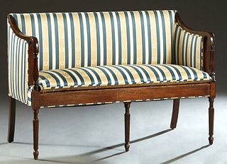 Inlaid Carved Mahogany Sheraton Style Settee, early 20th c., the upholstered back flanked by upholstered arms, on turned reeded supports, to a cushion