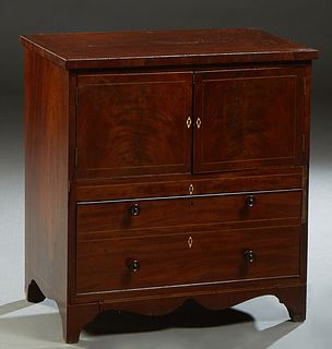 English Inlaid Mahogany Chest, late 19th c., the lifting lid over a double door storage compartment, above a deep drawer, on a bracket plinth, H.- 31 
