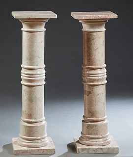 Pair of Figured Pale Pink Marble Pedestals, 20th c., the square top over a turned tapered support to a square base, H.- 40 1/8 in., W.- 11 3/4 in., D.