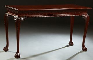 Chippendale Style Carved Mahogany Console Table, 20th/21st c., the stepped rectangular top over a carved skirt, on cabriole legs with large ball and c