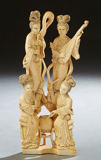 Chinese Carved Bone Figural Group, early 20th c., of four female musicians, with scrimshaw decoration, on an integral base, signed on the underside, H