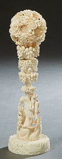 Chinese Intricately Carved Bone Puzzle Ball, on a tapered dragon and tree form Bone stand, Puzzle Ball- Dia.- 4 in., Stand- H.- 11 in., Dia.- 4 3/8 in