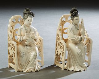 Pair of Chinese Carved Bone Figures, 20th c., of female musicians sitting in arm chairs, with scrimshaw decoration, H.- 6 1/2 in., W.- 4 in., D.- 3 1/