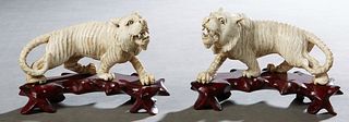 Pair of Chinese Carved Bone Tigers, late 19th c., on custom carved mahogany bases, H.- 3 1/2 in., W.- 5 1/2 in., D.- 1 1/2 in. Provenance: Palmira, th