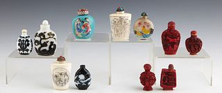 Group of Eleven Chinese Snuff Bottles, 20th c., four of cinnabar, two of Bone, four of glass, and one porcelain example, Largest Bone- H.- 3 in., W.- 
