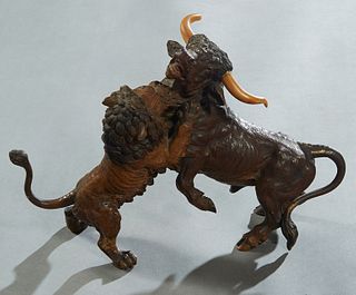 Attr. to Franz Xavier Bergmann (1861-1936, Austrian), "Lion Attacking a Steer," early 20th c., cold painted bronze, with carved Bone horns, unsigned, 