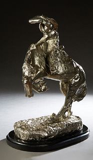 After Frederic Remington (American, 1861-1909), "The Rattlesnake," 20th c., silverplated iron, with an impressed signature on back, presented on a ste