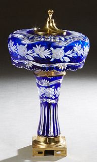 Cobalt Cut-to-Clear Crystal Lamp, 20th c., the octagonal floral decorated glass shade on a tapered fluted support, to a square brass base, the shade w