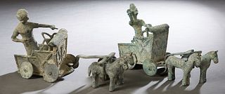 Two Ancient Roman Patinated Bronze Horse Drawn Chariots, with drivers, H.- 8 in., W.- 12 1/2 in., D.- 3 1/2 in. Provenance: Palmira, the Estate of Sar