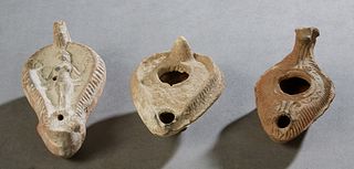 Group of Three Pottery Oil Lamps, perhaps Roman, Largest- H.- 1 7/8 in., W.- 4 3/4 in., D,- 2 1/2 in. Provenance: Palmira, the Estate of Sarkis Kaltak