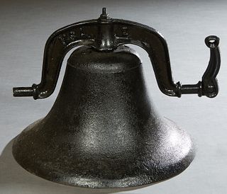 Cast Iron Plantation Bell, 19th c., marked "USA," with a clapper, H.- 14 in., Dia.- 16 in.