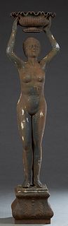 Cast Iron Garden Figure, 20th c., of a nude female holding an urn over her head on an interior tapered relief square base, H.- 72 in., W.- 18 1/2 in.,