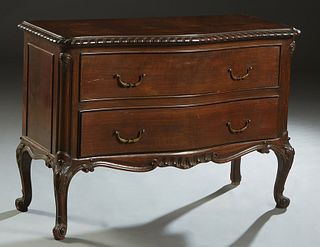 English Style Carved Mahogany Bowfront Chest, early 20th c., the stepped gadrooned edge top over two deep drawers, flanked by fielded panel sides, on 