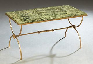 French Empire Style Brass Plated Iron Marble Top Coffee Table, 20th c., with an inset figured green marble over curved trestle legs joined by a cylind