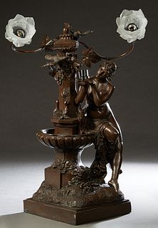 Bronze Patinated Composition Figural Newel Post Lamp, 20th c., with a maiden at a fountain, in front of three curved light arms, on an integral steppe