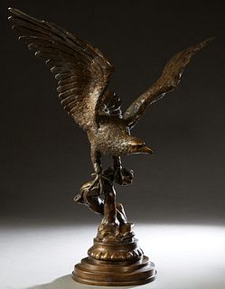 Large Patinated Bronze Eagle in Flight, 20th/21st c., on an integral stepped circular base, H.- 32 in., W.- 32 in., D.- 16 in. Provenance: Palmira, th